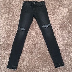 Stretchy distressed dark grey jeans